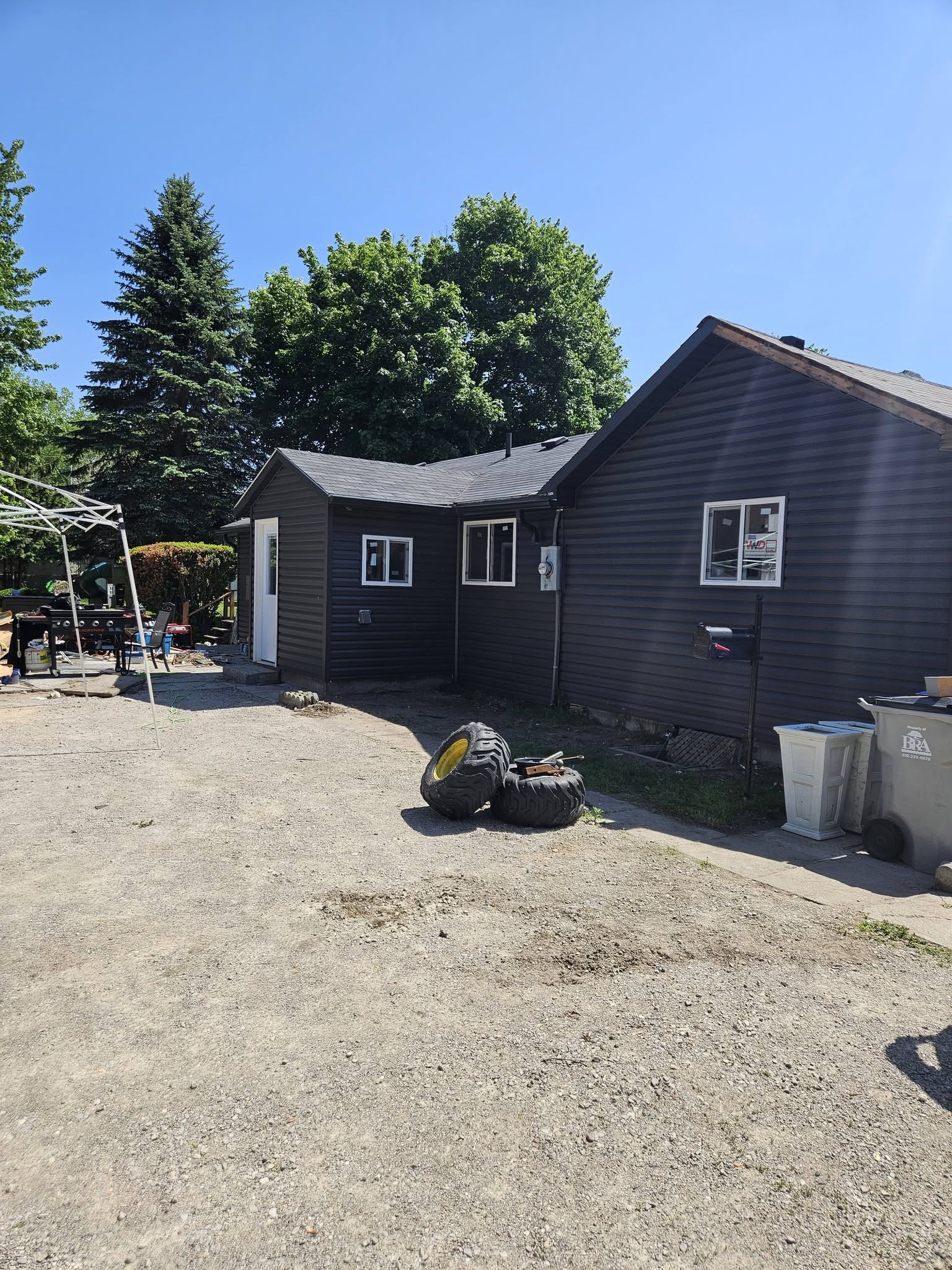 Finished Strathroy fire-damage restoration with new exterior siding